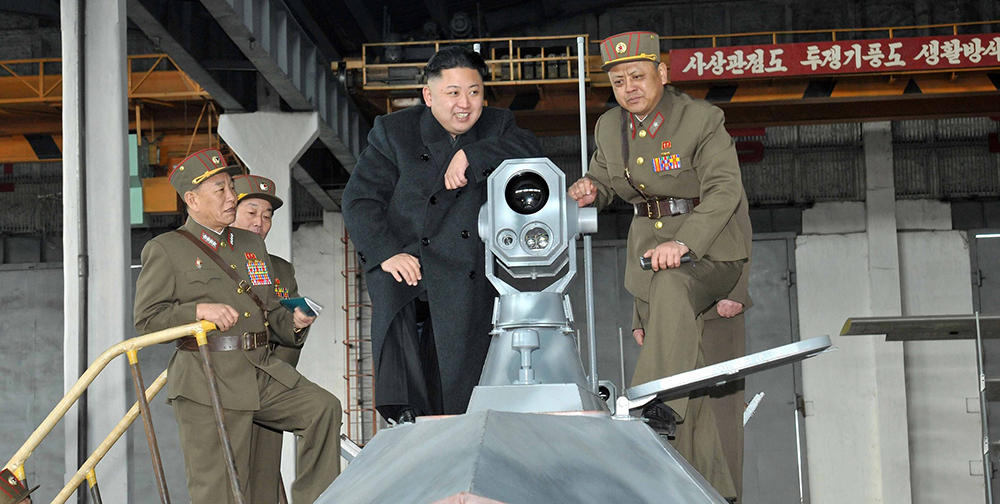 North Korean leader Kim Jong-un looks at the latest combat and technical equipments, made by unit 1501 of the Korean People's Army, during his visit to the unit